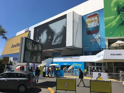 a large billboard on the side of a building at Appartement Cannes sur Croisette in Cannes