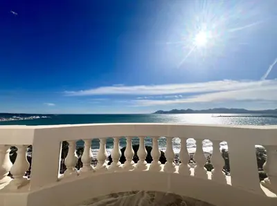 a view of the ocean from the balcony of a condo at CROISETTE Palais MIRAMAR FRONT DE MER in Cannes