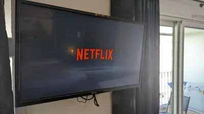 a television with the words netflix on the screen at Studio Vieux Port 3 étoiles in Cannes
