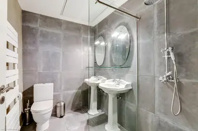 a bathroom with a sink and a toilet and a shower at Florella Félix Faure in Cannes
