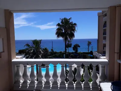 a balcony with a view of the ocean at Cannes design vue mer in Cannes