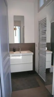 a bathroom with a sink and a mirror at Happy days, by Welcome to Cannes in Cannes