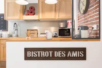 a kitchen with a sign that reads britoit des amps at Maria Sea Cannes in Cannes
