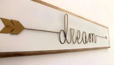 a wooden sign with the word marrow hanging on a wall at Viva Riviera Cosy and Large 2 Bedrooms with balcony in Cannes