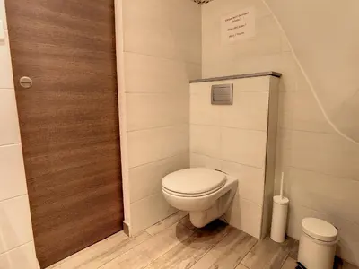 a small bathroom with a toilet in a room at 1 bedroom Forville, 4 min Palais,Plages,Croisette in Cannes