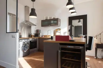 a kitchen with a sink and a dishwasher at Budin Sea Cannes in Cannes