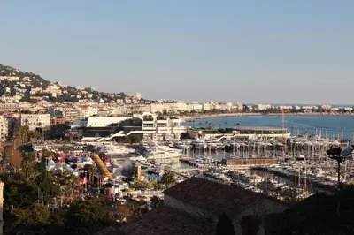 a view of a harbor with boats in the water at Le Pavillon113 in Cannes