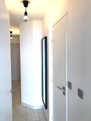 a bathroom with a shower and a glass door at Appartement Vue Mer Cannes Azur in Cannes