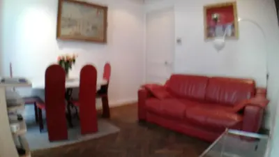 a bedroom with a white bed and two lamps at Cannes, Le Suquet in Cannes