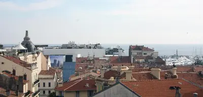 a view of a city with roofs and buildings at Appartement vue Mer, Suquet et Palais avec parking in Cannes