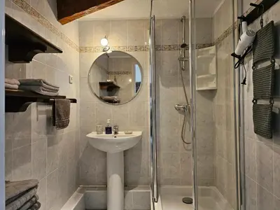 a bathroom with a sink and a shower at SUQUET - BEACH 100m & PALAIS DES FESTIVALS 600m in Cannes