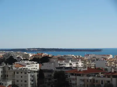 a view of the city and the water at VUE MER - Appartement T2 in Cannes