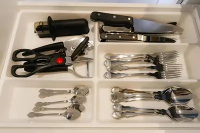 a white tray with utensils in a drawer at Delaup Sea Cannes in Cannes