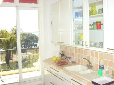 a kitchen with a sink and a window at Appartement moderne à Cannes avec vue sur mer et montagne - 85 m² in Cannes