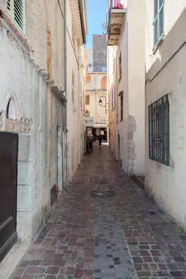 an empty alley way in an old building at Frères Suquet Sea Cannes in Cannes