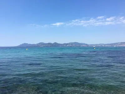 a large body of water with mountains in the background at Lovely Studio Cannes in Cannes