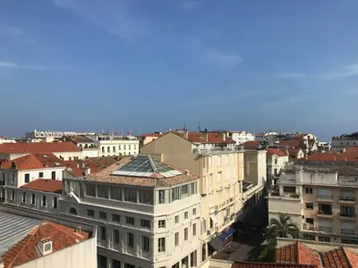 a view of a city with buildings and roofs at Cannes Festival in Cannes