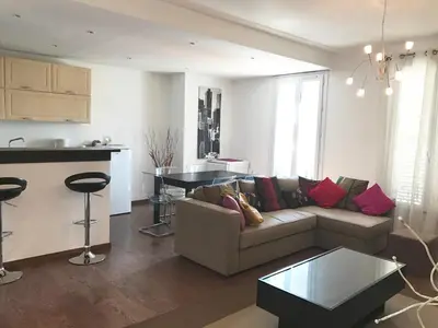 a living room with a couch and a table at Cannes Festival in Cannes