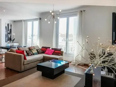 a living room with a couch and a table at Cannes Festival in Cannes