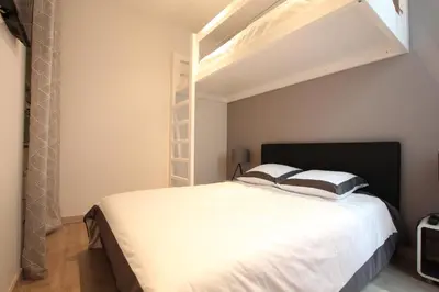 a bedroom with a bed with a loft bed at Cosy-Cocoon in Cannes