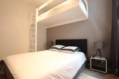 a bedroom with a bed with a loft bed at Cosy-Cocoon in Cannes