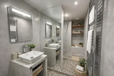 a bathroom with two sinks and two mirrors at Cannes center perfect 3 bedroom in Cannes