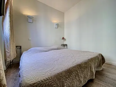 a bedroom with a large bed in a room at Le Saint-Pierre PET231 2P in Cannes