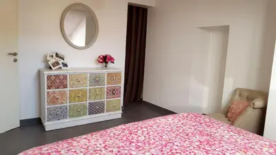 a bedroom with a bed and a mirror and a dresser at Cannes,croisette,palais des festivals,plages in Cannes