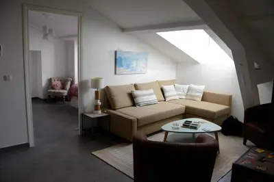 a living room with a couch and a table at Cannes,croisette,palais des festivals,plages in Cannes