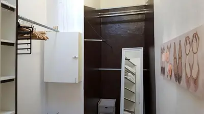 a walk in closet with a refrigerator and a mirror at Cannes,croisette,palais des festivals,plages in Cannes