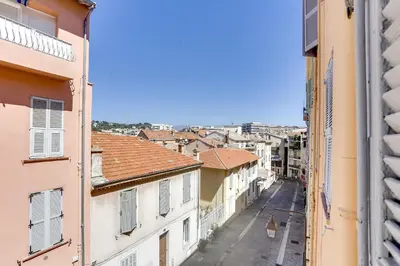 a view of a city street from a building at IMMOGROOM - Historic Area Le Suquet - 6min from the beaches in Cannes