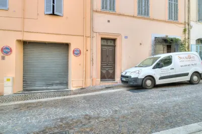 a white van parked on the side of a street at IMMOGROOM - Historic Area Le Suquet - 6min from the beaches in Cannes