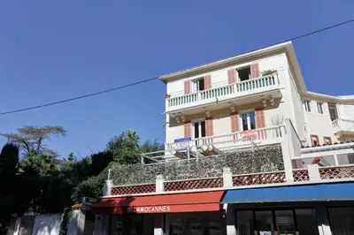 a building on the side of a street at Appartements Cannes in Cannes