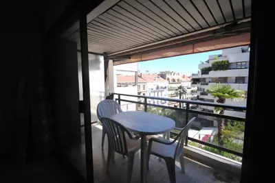 a table and chairs on a balcony with a view at Résidence Gray d'Albion Studio BRA507 in Cannes