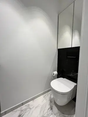 a bathroom with a white toilet and a mirror at Résidence Gray d'Albion appartement DEL562 in Cannes