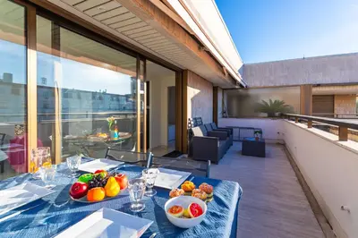 a table with fruits and vegetables on a balcony at Résidence Gray d'Albion appartement DEL562 in Cannes