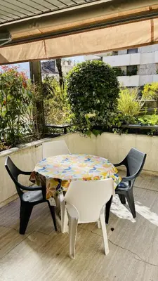 a table and chairs sitting on a patio at Résidence Gray d'Albion Studio ROU503 in Cannes