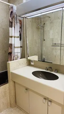 a bathroom with a sink and a mirror at Résidence Gray d'Albion Studio ROU503 in Cannes