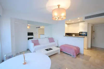 a living room with a couch and a table at Résidence Gray d'Albion 2P LIU5376 in Cannes