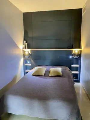 a bedroom with a large bed with two pillows at Résidence Gray d'Albion 2P 5402 in Cannes