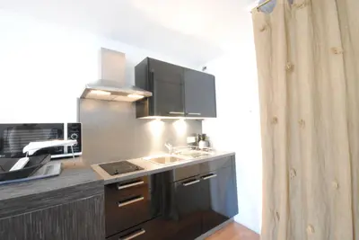 a kitchen with a sink and a counter top at Les Serbes 2P RET29 in Cannes