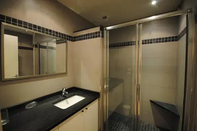 a bathroom with a sink and a shower at Résidence Gray d'Albion 2P NAP558 in Cannes