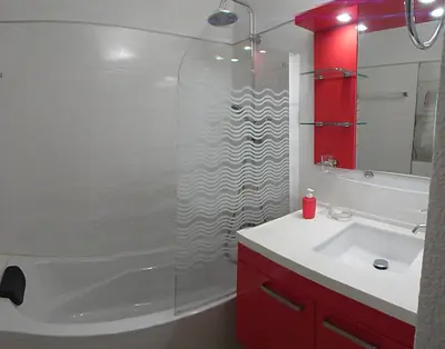 a bathroom with a shower with a sink and a tub at CANNES plage 2mn/45m2/vue mer/inernet/clim/parking privé in Cannes