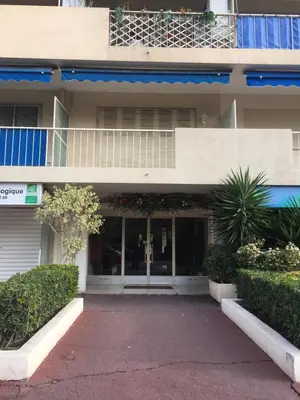 a building with a walkway in front of it at Studio Cannes la Croisette in Cannes