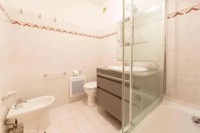 a bathroom with a shower sink and a toilet at Apartment 2 bedrooms 2 bathrooms clear view in Palm beach area in Cannes
