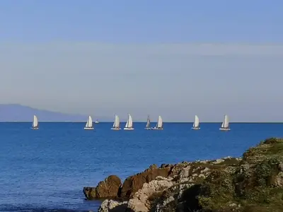 a group of sailboats on a large body of water at 5 min to sea and Palais des Festivals in Cannes