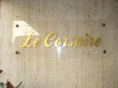 a sign that says be caterer on a wall at Apartment Le Corsaire-5 by Interhome in Cannes