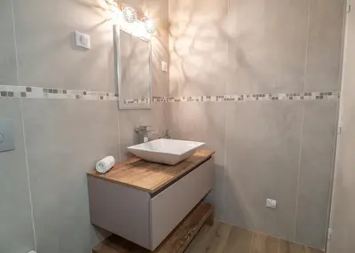 a bathroom with a sink and a mirror at Loft de standing Cannes in Cannes