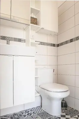 a white bathroom with a toilet and a sink at #StudioCosy @ Center Cannes in Cannes
