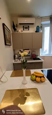 a kitchen with a plate of fruit on a counter at La Petit Maison du Bonheur in Cannes